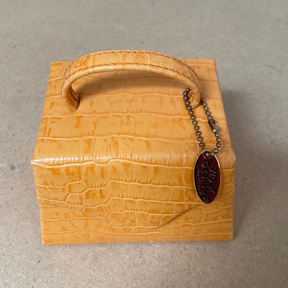 Wolf Designs Travel Leather Jewelry Box. Orange